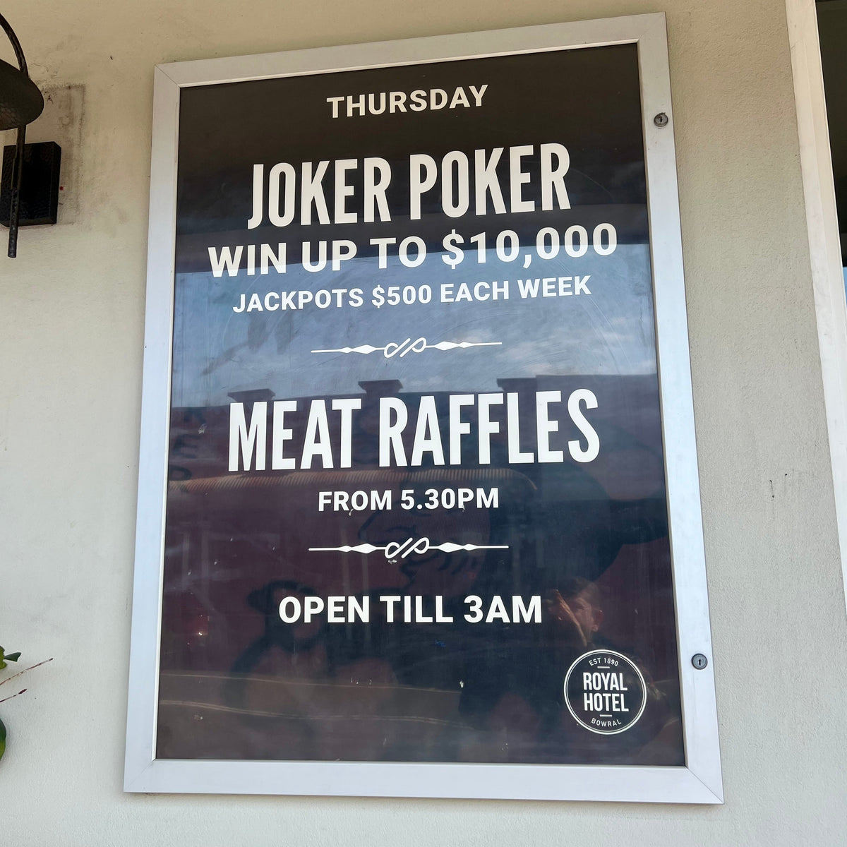 Promotional poster for Joker Poker and meat raffles at the Royal Hotel.